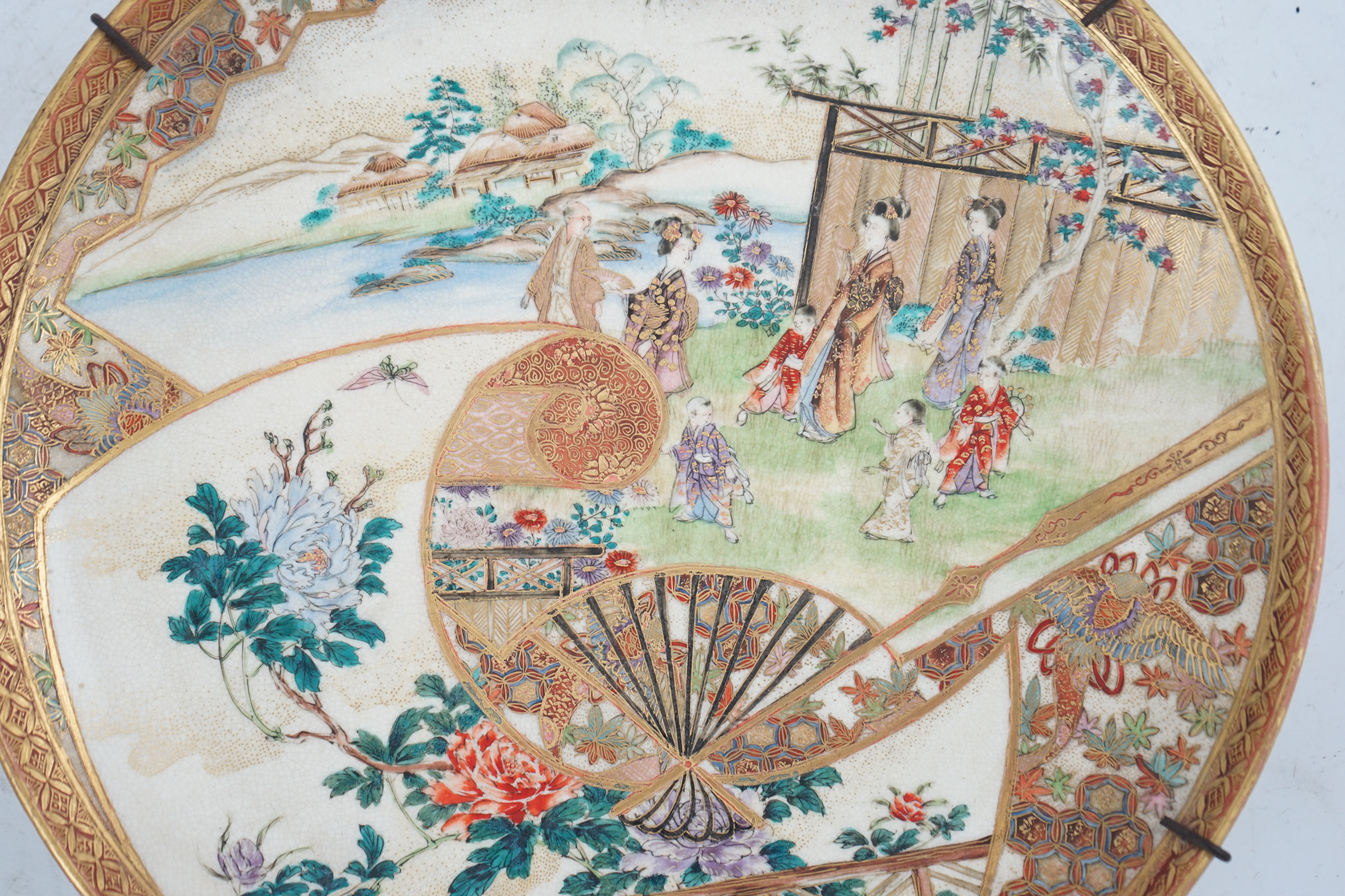 A Japanese Satsuma ‘garden scene’ dish, Meiji period